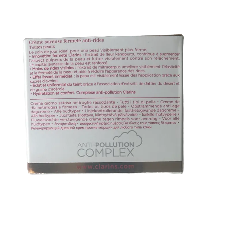 Clarins anti-pollution complex packaging with text on a light gray background