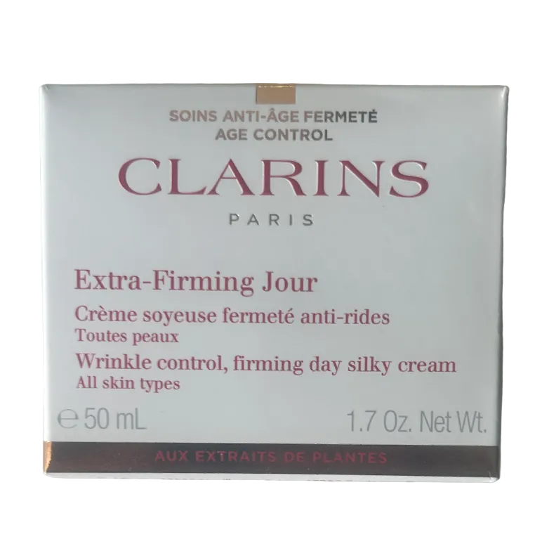 Clarins Extra-Firming Jour skincare product packaging on a light background